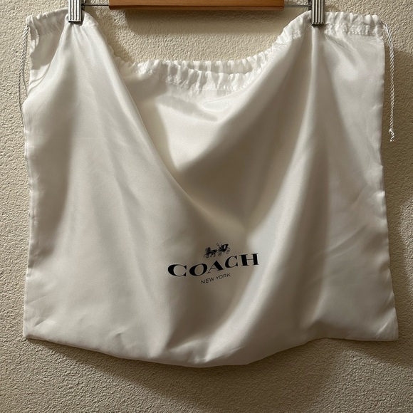 Coach Handbags - Coach Duster Pouch White With Logo Satin Drawstring Handbag storage